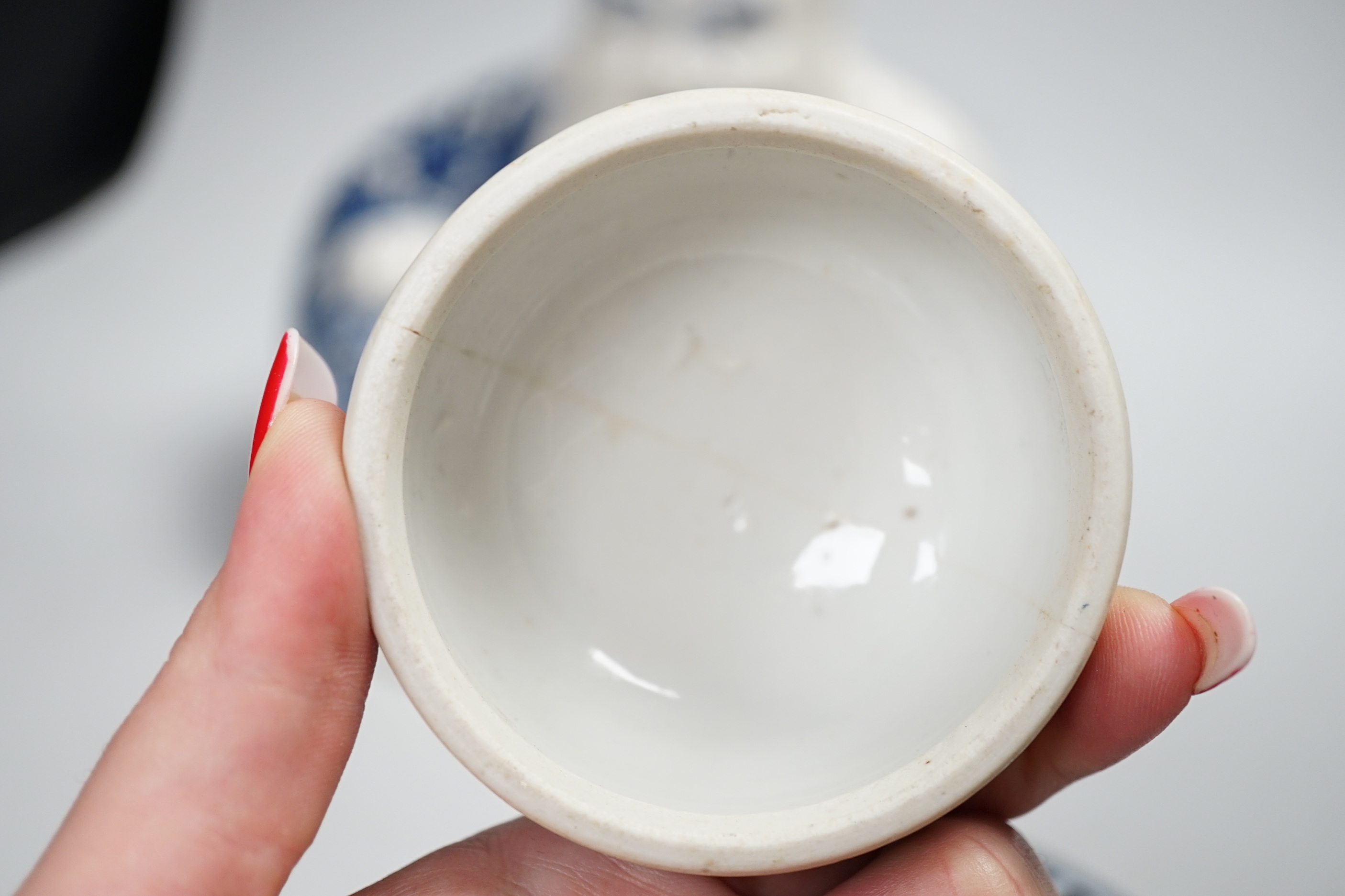 Chinese ceramics including a Buddha, prunus flower ginger jar and plates, the largest 26cm high